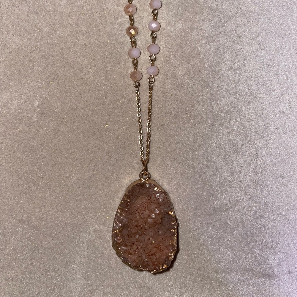 Beautiful necklace from earthbound , rose gold cokes rock